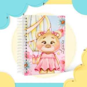 Caderneta de Vacina Ursinha Baloeira 29 Caderno espiral com capa ilustrada com ursinha de vestido rosa e balão
