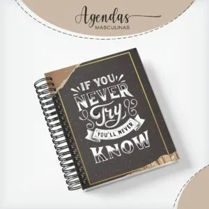Capa Agenda Masculina If You 10 Caderno espiral com capa escura e frase motivacional em destaque sobre fundo bege.