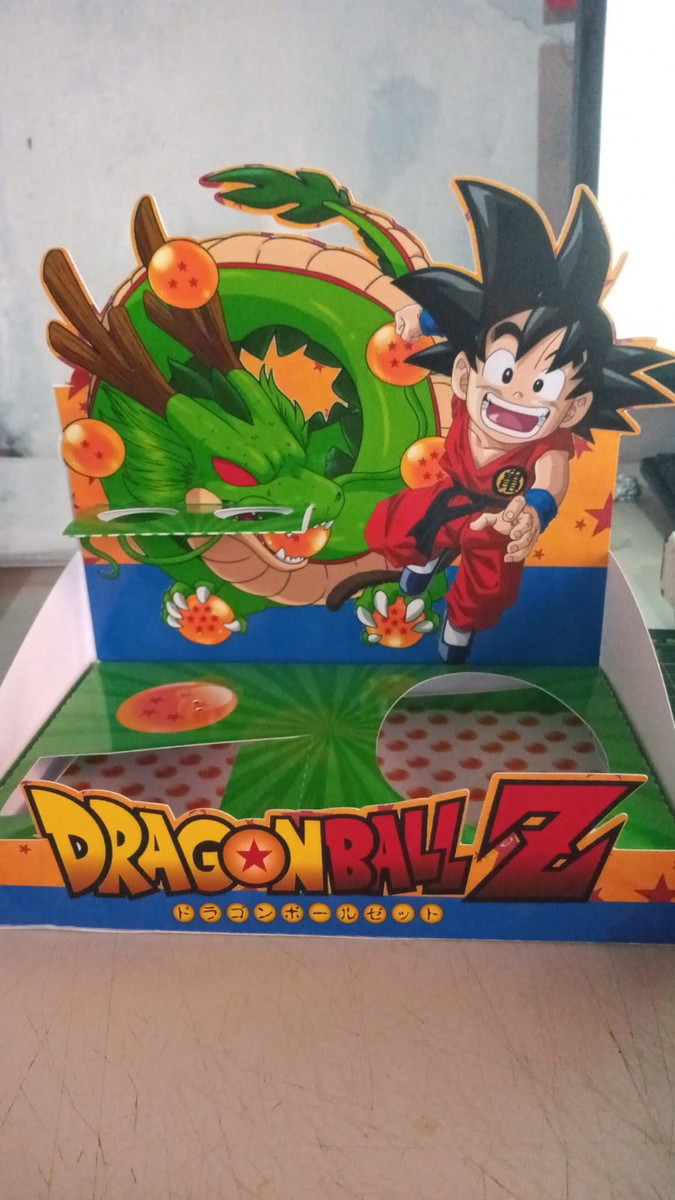 Cestinhas Páscoa Studio - Arquivo Digital 3 Arte digital vibrante de Dragon Ball Z com dragão e herói.