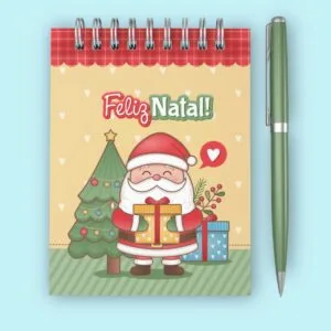 Caderneta com tema natalino, ilustração de Papai Noel, árvore e caneta verde.