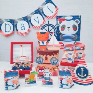 Kit Festa Só um bolinho Marinheiro 9 Decoração de festa infantil com tema náutico contendo personagens animais marinheiros e itens personalizados.